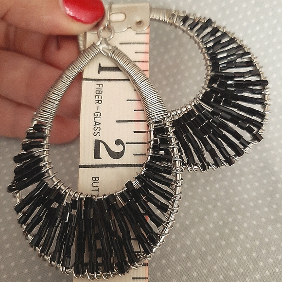 Oval Hoop Earrings - Picture 2 of 3